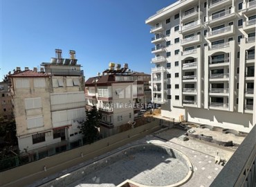 Двухкомнатные апартаменты, 65,5м², в резиденции премиум класса на этапе строительства в центре Алании, 600м от моря ID-17853 фото-11