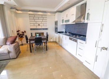 Меблированный четырехкомнатный садовый дуплекс, 150м² в 300м от моря в районе Алании Конаклы под ВНЖ ID-17856 фото-5