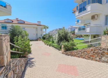Меблированный четырехкомнатный садовый дуплекс, 150м² в 300м от моря в районе Алании Конаклы под ВНЖ ID-17856 фото-18
