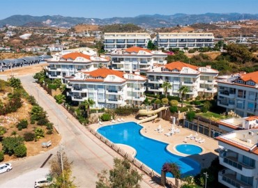 Меблированный четырехкомнатный садовый дуплекс, 150м² в 300м от моря в районе Алании Конаклы под ВНЖ ID-17856 фото-19