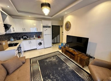 Уютная двухкомнатная квартира, 50м², с выходом в сад в комплексе премиум класса в Каргыджаке, Алания ID-17864 фото-3