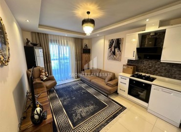 Уютная двухкомнатная квартира, 50м², с выходом в сад в комплексе премиум класса в Каргыджаке, Алания ID-17864 фото-5
