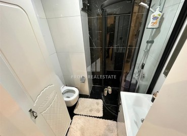 Уютная двухкомнатная квартира, 50м², с выходом в сад в комплексе премиум класса в Каргыджаке, Алания ID-17864 фото-9