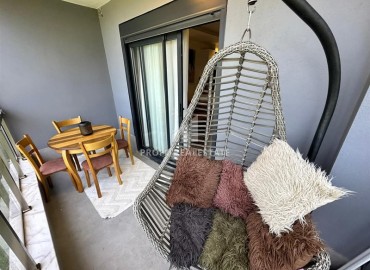 Уютная двухкомнатная квартира, 50м², с выходом в сад в комплексе премиум класса в Каргыджаке, Алания ID-17864 фото-10