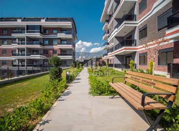 Уютная двухкомнатная квартира, 50м², с выходом в сад в комплексе премиум класса в Каргыджаке, Алания ID-17864 фото-12