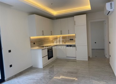 Двухкомнатная квартира, 55м², с элегантной чистовой отделкой в комфортабельной резиденции в центре Алании, возможно ВНЖ ID-17869 фото-2
