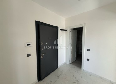 Двухкомнатные апартаменты, 55м². с прекрасным видом в комплексе премиум класса в районе Махмутлар, Алания ID-17885 фото-5