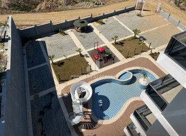 Двухкомнатные апартаменты, 55м². с прекрасным видом в комплексе премиум класса в районе Махмутлар, Алания ID-17885 фото-10