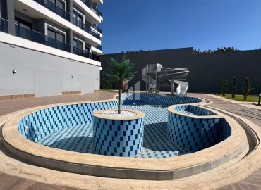 Двухкомнатные апартаменты, 55м². с прекрасным видом в комплексе премиум класса в районе Махмутлар, Алания ID-17885 фото-15