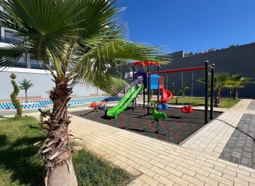 Двухкомнатные апартаменты, 55м². с прекрасным видом в комплексе премиум класса в районе Махмутлар, Алания ID-17885 фото-16