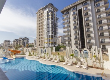 Стильные двухкомнатные апартаменты, 54м², в элитной резиденции в Махмутларе, в 750м от моря, Алания ID-17889 фото-14