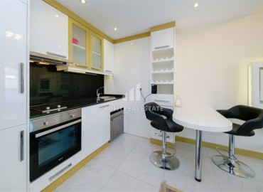 Bright furnished apartment 1+1, 45m², in a residence with extensive facilities, in the very center of Alanya ID-16121 фото-5