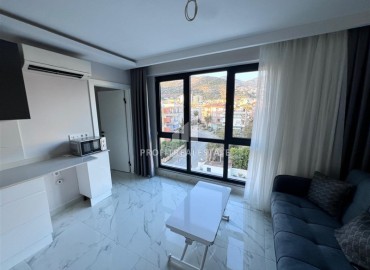 Меблированная квартира с одной спальней, 45м², с видом на горы в новостройке у пляжа Клеопатры в центре Алании ID-17922 фото-6
