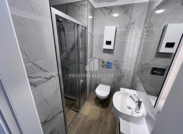 Меблированная квартира с одной спальней, 45м², с видом на горы в новостройке у пляжа Клеопатры в центре Алании ID-17922 фото-11