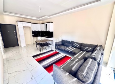 One-bedroom apartment, 60m², in a residence with good facilities under construction in Oba, Alanya ID-16018 фото-2