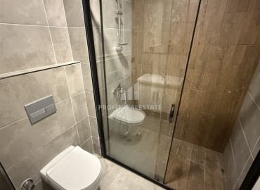 One bedroom apartment, 60m², in a comfortable new building with a winter pool in Mahmutlar, 450m from the sea ID-16676 фото-10