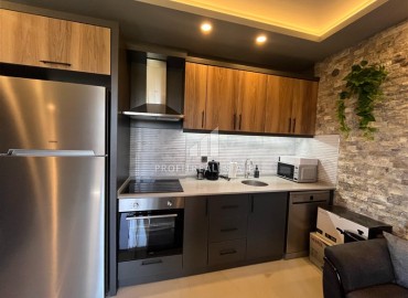 Элегантная двухкомнатная квартира, 50м², в новом комплексе с инфраструктурой в центре Алании ID-17967 фото-6
