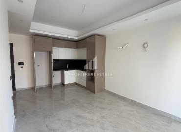 Апартаменты с одной спальней, 60м², в новом комплексе с полной инфраструктурой в районе Алании -  Махмутлар ID-17968 фото-5