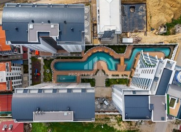 Апартаменты с одной спальней, 60м², в новом комплексе с полной инфраструктурой в районе Алании -  Махмутлар ID-17968 фото-18