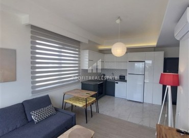 Двухкомнатные апартаменты 59 м2, в 1000 метрах от моря в Авсалларе ID-17970 фото-1