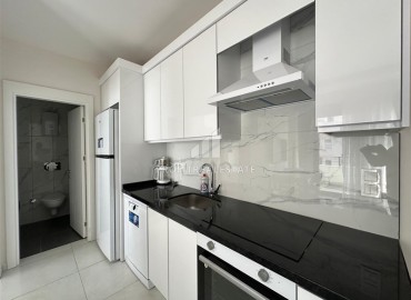 Уютная квартира с одной спальней, 50м², в новостройке с инфраструктурой в Махмутларе, с отличной локацией в 600м от моря, Алания ID-17971 фото-4