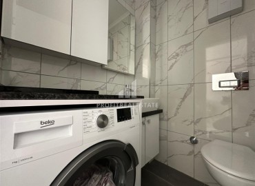 Уютная квартира с одной спальней, 50м², в новостройке с инфраструктурой в Махмутларе, с отличной локацией в 600м от моря, Алания ID-17971 фото-6