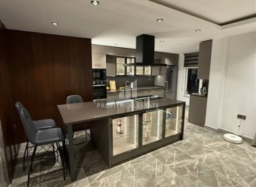 Линейная четырехкомнатная квартира, 145м², с дизайнерским интерьером в элитном комплексе в Джикджилли, Алания ID-17972 фото-4