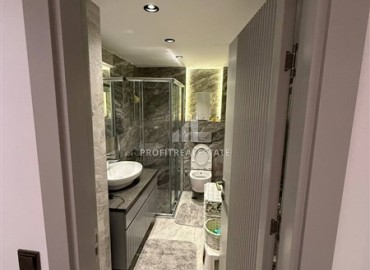 Линейная четырехкомнатная квартира, 145м², с дизайнерским интерьером в элитном комплексе в Джикджилли, Алания ID-17972 фото-15