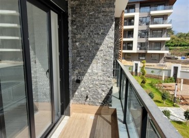 Симпатичная квартира с одной спальней, 50м², в новой резиденции с инфраструктурой в районе Оба, Алания ID-17975 фото-9