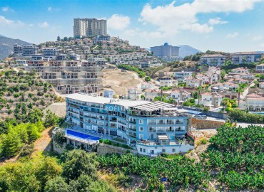 Стильная однокомнатная квартира-студия, 40м², в комплексе с хорошей инфраструктурой в Каргыджаке, Алания ID-17985 фото-13