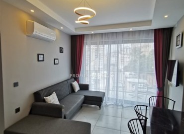 Меблированная двухкомнатная квартира, 48м², в новостройке с инфраструктурой в районе Алании Тосмур ID-17991 фото-2