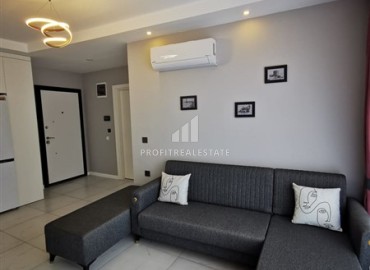 Меблированная двухкомнатная квартира, 48м², в новостройке с инфраструктурой в районе Алании Тосмур ID-17991 фото-3