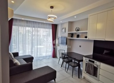 Меблированная двухкомнатная квартира, 48м², в новостройке с инфраструктурой в районе Алании Тосмур ID-17991 фото-4