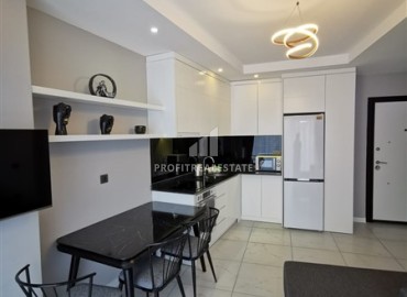 Меблированная двухкомнатная квартира, 48м², в новостройке с инфраструктурой в районе Алании Тосмур ID-17991 фото-5