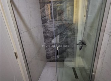 Меблированная двухкомнатная квартира, 48м², в новостройке с инфраструктурой в районе Алании Тосмур ID-17991 фото-9