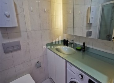 Меблированная двухкомнатная квартира, 48м², в новостройке с инфраструктурой в районе Алании Тосмур ID-17991 фото-10