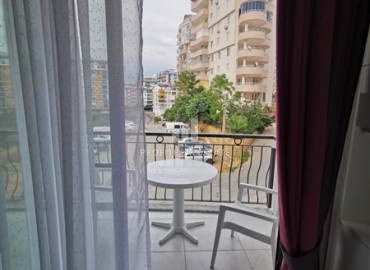 Меблированная двухкомнатная квартира, 48м², в новостройке с инфраструктурой в районе Алании Тосмур ID-17991 фото-11