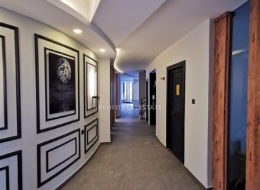 Меблированная двухкомнатная квартира, 48м², в новостройке с инфраструктурой в районе Алании Тосмур ID-17991 фото-14