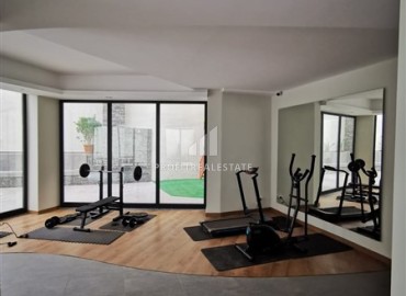 Меблированная двухкомнатная квартира, 48м², в новостройке с инфраструктурой в районе Алании Тосмур ID-17991 фото-19