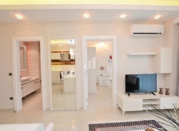 Стильная двухкомнатная квартира, 65м², в элитном комплексе Махмутлара, в 250м от Средиземного моря ID-17995 фото-8
