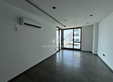 Инвестиционное предложение: двухкомнатная квартира 66,5 м2, в строящемся жилом комплексе у самого моря в Каргыджаке, Аланья ID-11536 фото-4