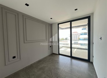 Инвестиционное предложение: двухкомнатная квартира 66,5 м2, в строящемся жилом комплексе у самого моря в Каргыджаке, Аланья ID-11536 фото-5