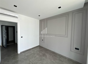 Инвестиционное предложение: двухкомнатная квартира 66,5 м2, в строящемся жилом комплексе у самого моря в Каргыджаке, Аланья ID-11536 фото-6