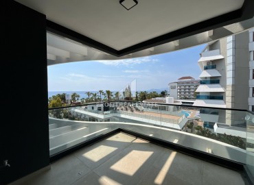 Инвестиционное предложение: двухкомнатная квартира 66,5 м2, в строящемся жилом комплексе у самого моря в Каргыджаке, Аланья ID-11536 фото-7