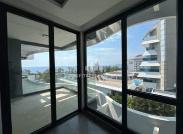 Инвестиционное предложение: двухкомнатная квартира 66,5 м2, в строящемся жилом комплексе у самого моря в Каргыджаке, Аланья ID-11536 фото-10