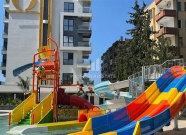 : Видовые апартаменты в аренду 1+1, 55м², в комплексе с отельной инфраструктурой через дорогу от собственного пляжа в Махмутларе, Алания ID-17998 фото-20