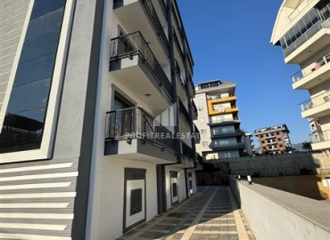 Двухкомнатная квартира, 50м², с чистовой отделкой в комплексе с бассейном у подножия гор Алании. ID-18002 фото-1
