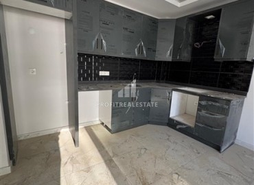 Двухкомнатная квартира, 50м², с чистовой отделкой в комплексе с бассейном у подножия гор Алании. ID-18002 фото-3