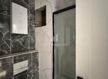 Двухкомнатная квартира, 50м², с чистовой отделкой в комплексе с бассейном у подножия гор Алании. ID-18002 фото-8