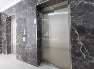 Меблированные апартаменты с одной спальней, 47м² в комфортабельной новостройке, в Авсалларе, Алания ID-18003 фото-10